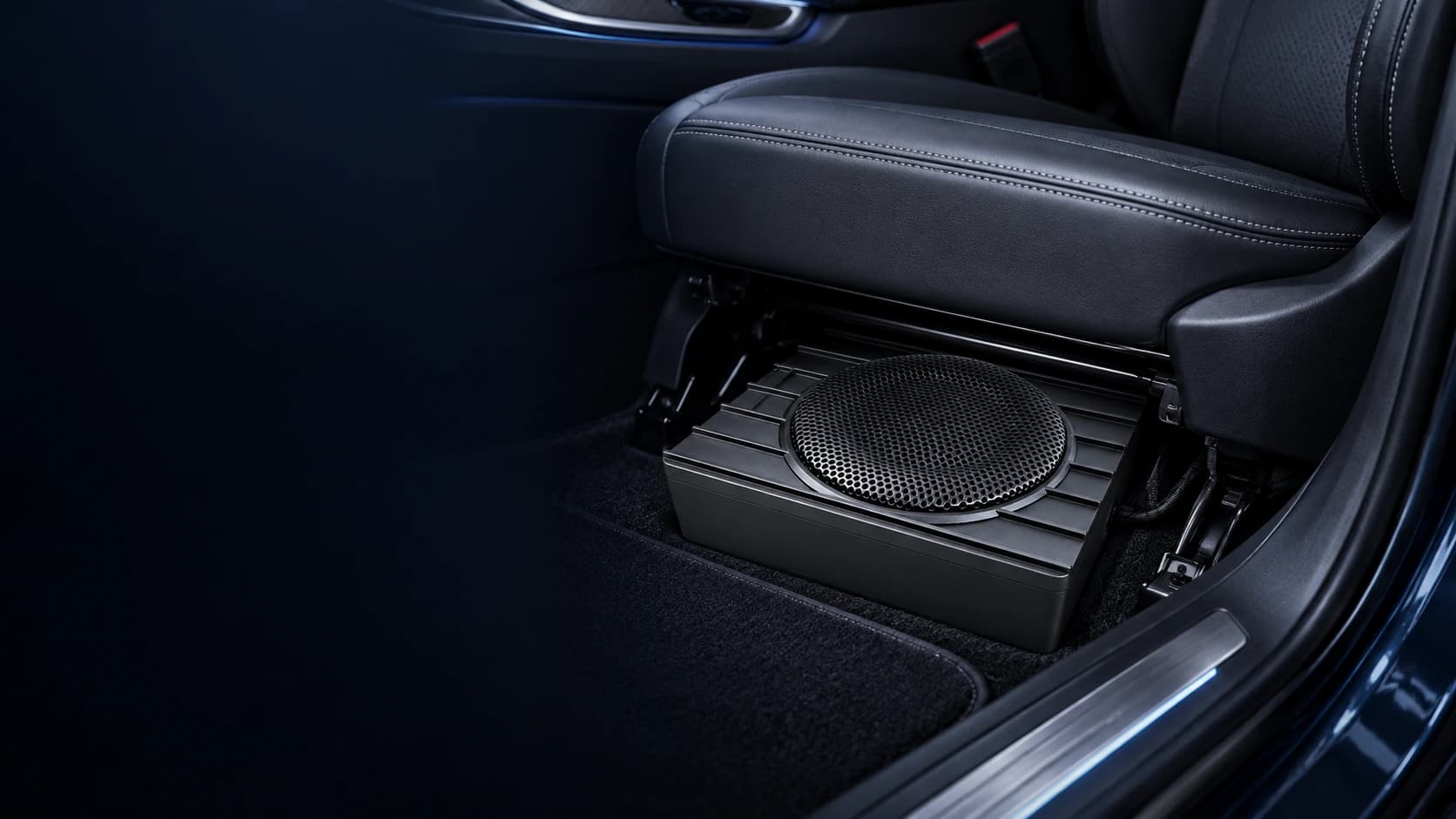 ZM-6.5C01-P active subwoofer installed under a passenger seat
