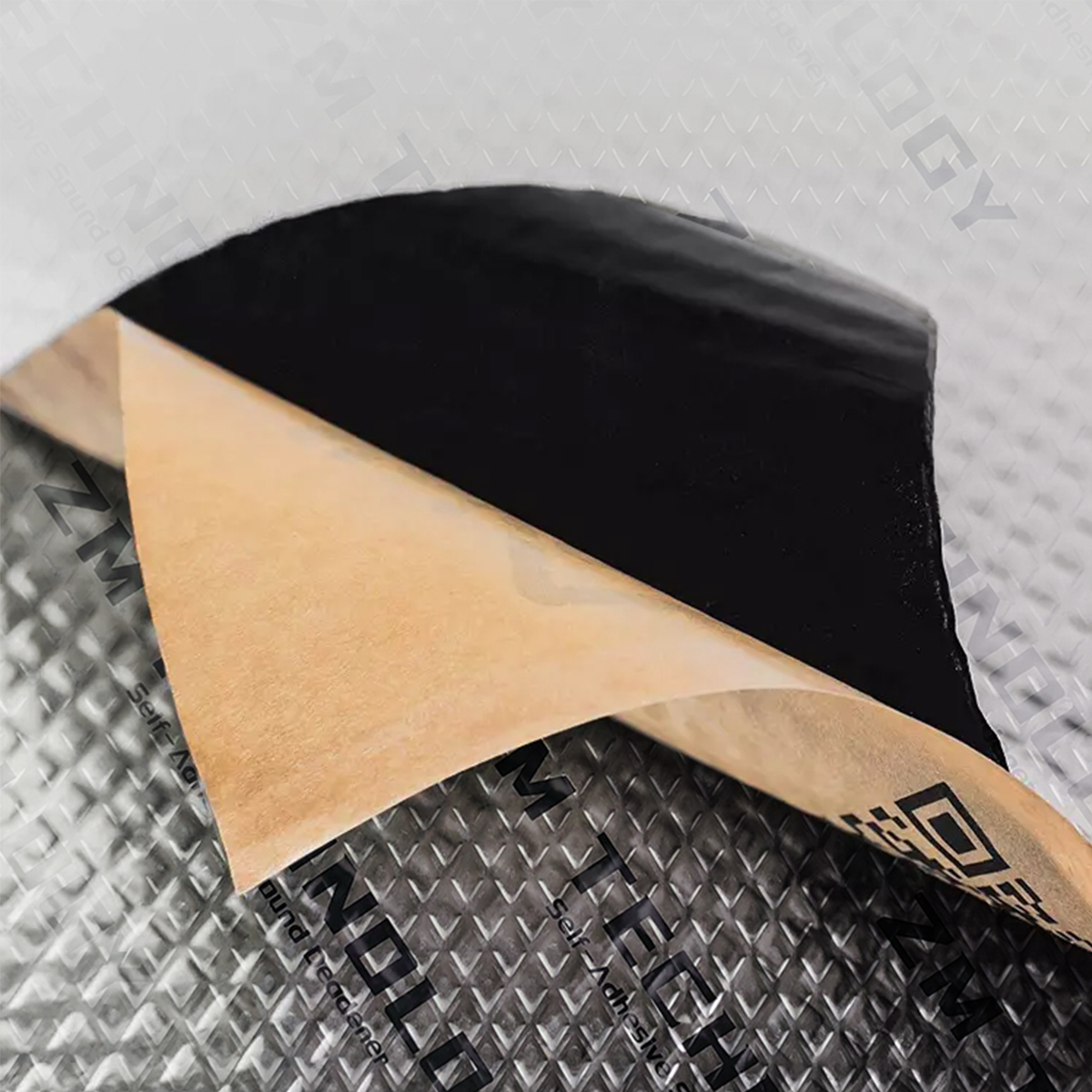 Aluminium foil, black butyl layer and brown release paper